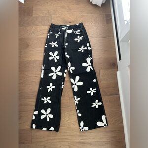 Black Floral Wide-Leg Jeans - White Daisy Print from Dry Goods